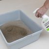 Litter Box Odor Eater product being sprayed to a cat litter box to remove odor